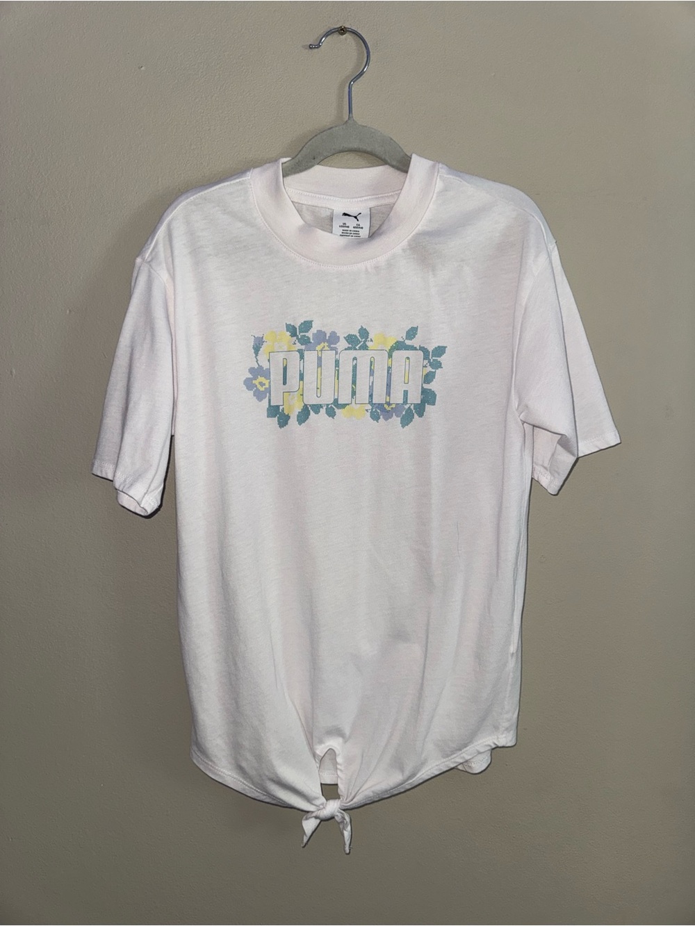 Puma White Tie-Hem Tee with Blue and Yellow Floral Logo